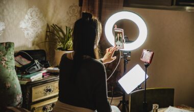 female influencer filming content using phone in a bedroom