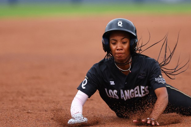 SPRINGFIELD, ILLINOIS - AUGUST 01: Mo'ne Davis #3 of the Los Angeles Queens slides into third base during the first inning of Women's Pro Baseball League Opening Day against the New York Heights at Robin Roberts Stadium on August 01, 2026 in Springfield, Illinois. (Photo by Jessie Alcheh/Getty Images)