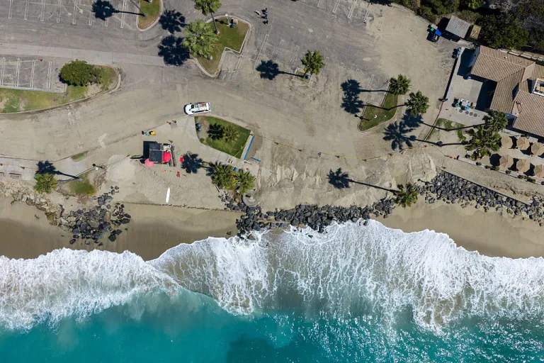 Powerful waves erase Southern California beaches, threaten homes