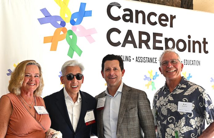 in front of the Cancer CAREpoint banner