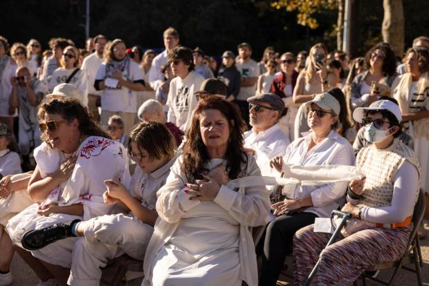 A person reacts during Yizkor, a Jewish prayer service for the dead.