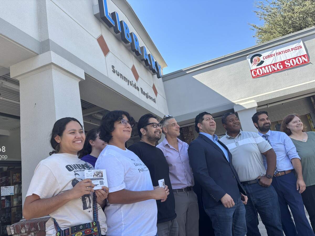 Employees and supporters of the Fresno County Library gathered at the Sunnyside Regional location on Monday, Sept. 28, 2026, to speak out against the potential of turning the public library’s catalog over to a private company.