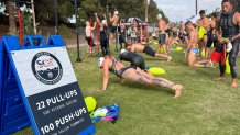 Tidelands Park served as a pit stop for athletes to take a bring from their swim. They did a workout honoring fallen military members, Coronado, Calif, September 19, 2026.