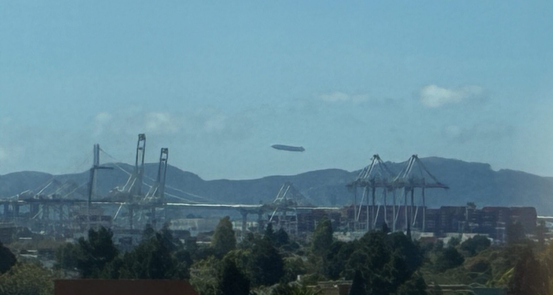 A massive airship drifted by the Port of Oakland today