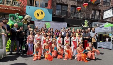 A large group poses in San Francisco's Chinatown