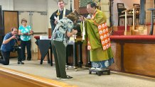 The Bishop Rev. Marvin Harada gives Buddhist names to members during Kieshiki Affirmation Ceremony, Sunday, September 20, 2026.