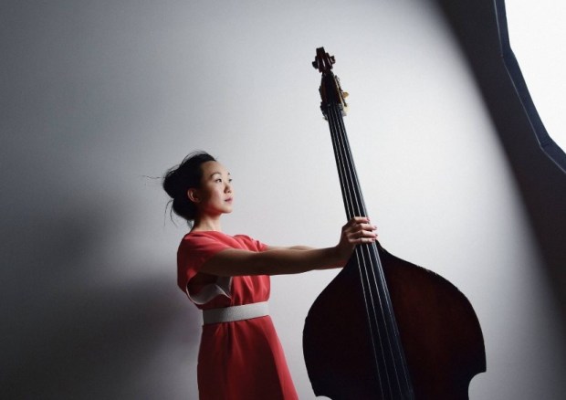 Bassist and composer Linda May Han Oh will perform with drummer Mark Whitfield Jr. and pianist Fabian Almazan at The JAI at the Conrad Prebys Performing Arts Center. (La Jolla Music Society)