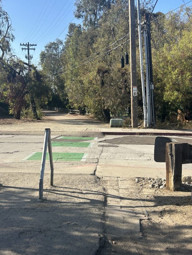 A stop sign was once located at Via Del Norte past the bike lane extension markings before it fell over a couple years ago. (Debbie Adams)