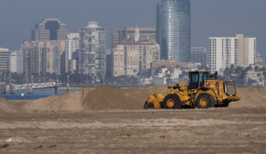 High tide, waves crash against Long Beach boardwalk from Hurricanes Odalys, Polo – Daily News