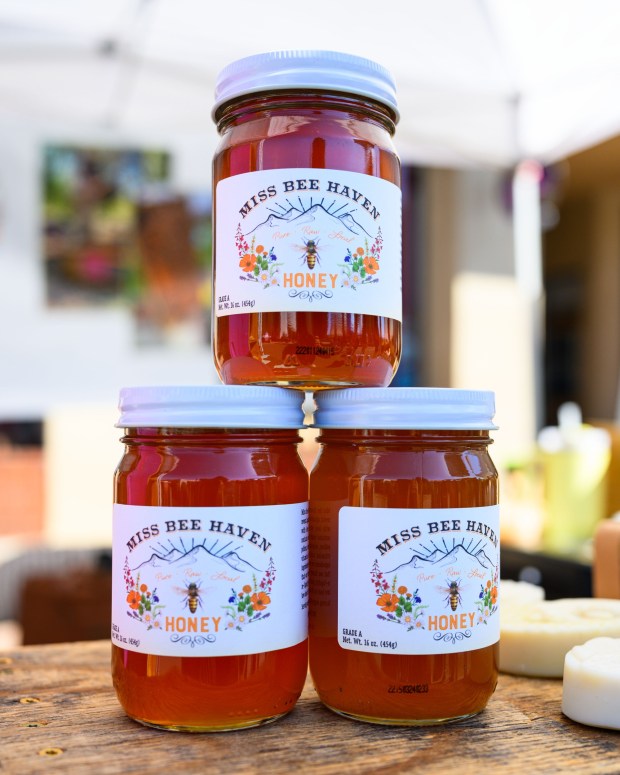Honey bottles sold by Miss Bee Haven Honey are photographed at a booth at the Martinez Farmers Market in Martinez, Calif., on Sunday, June 14, 2026. (Jose Carlos Fajardo/Bay Area News Group)