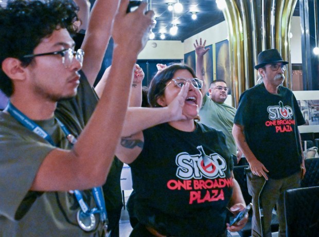 Maria Ceja, middle, shouts out during a meeting held in Santa Ana on Thursday September 17, 2026. Residents had a second opportunity to review the latest proposal for One Broadway Plaza, a 37-story urban high-rise offering residential suites, retail and restaurants proposed in Santa Ana.(Photo by Karen Tapia, Orange County Register/SCNG)