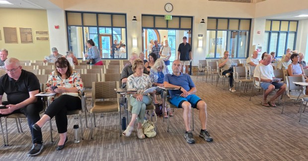 Poway residents waiting for the Sept. 8 Zone Zero Defensible Space Workshop to begin in the Poway City Council Chambers. (Julie Gallant)