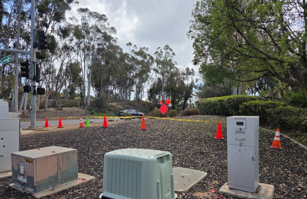 One southbound lane and sidewalks are closed on Espola Road near Ramona High School for a hazardous tree mitigation project. (Julie Gallant)