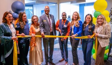 a group ribbon cutting event