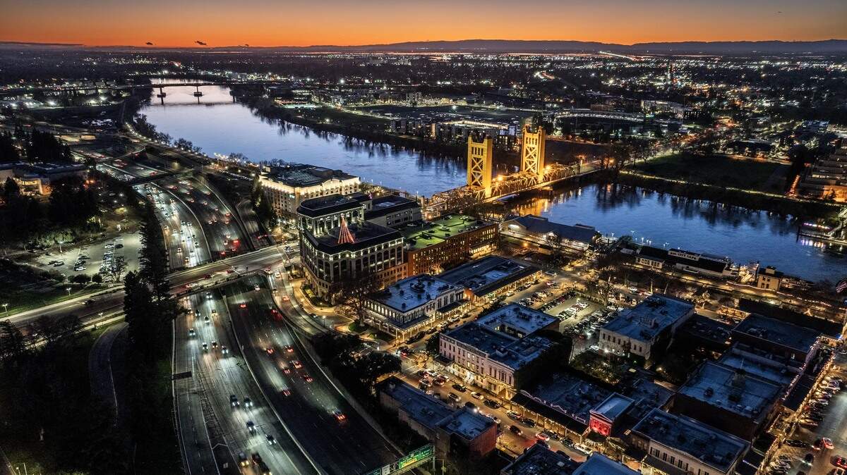 A view of the Sacramento River, Old Sacramento and the Tower Bridge at dusk on Saturday, Dec. 27, 2025.