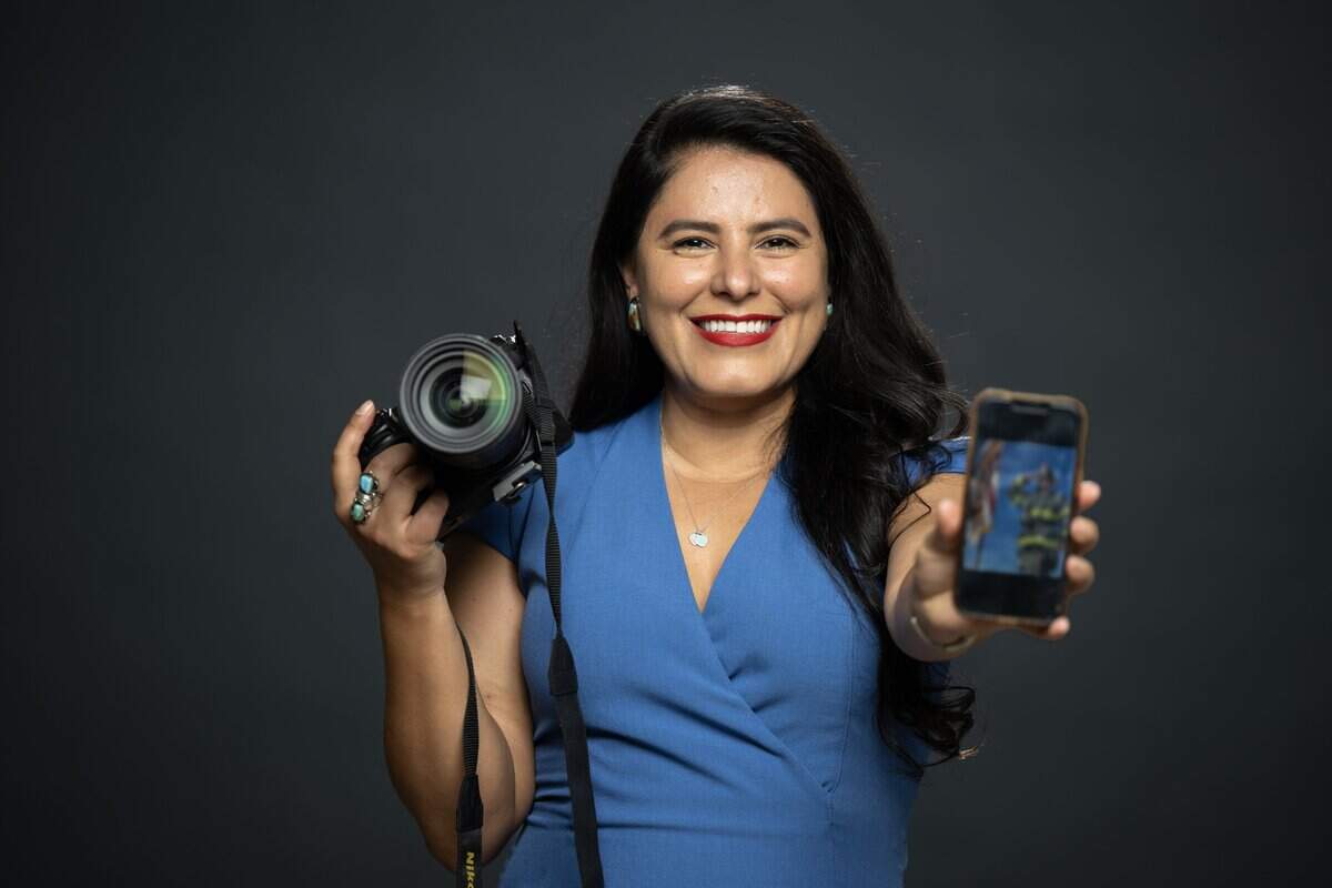 Wendy Aguilar, a former journalist and public relations and social media specialist, poses for a portrait after being recognized as one of this year's Change Makers on Wednesday, July 15, 2026.