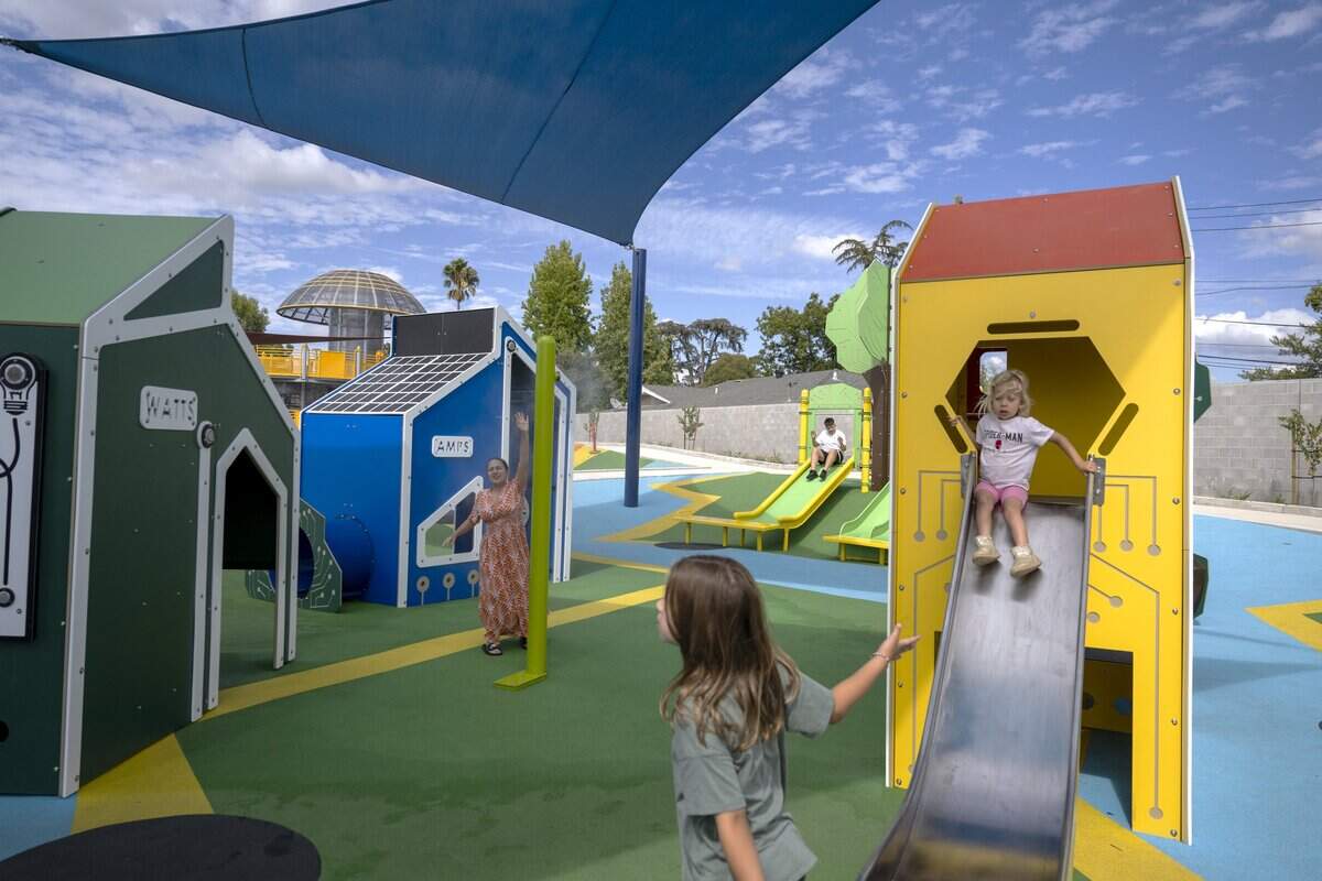 Children play at the new Empowerment Park, a sensory-friendly playground on Bell Street in Arden Arcade, on Wednesday.