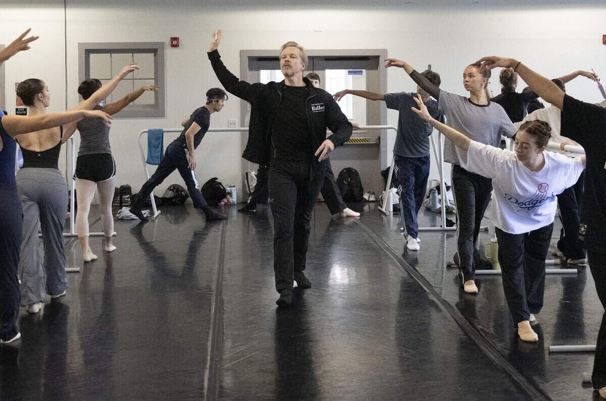 New Sacramento Ballet Artistic Director Tiit Helimets gives instructions during a class at Clara Studios on Wednesday.