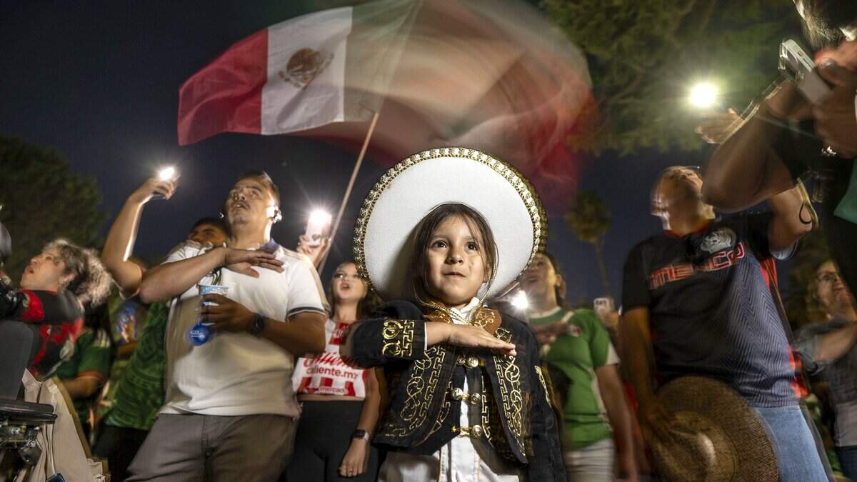 Diego Alfredo Maldonado, 5, of Sacramento, stands for the Mexican national anthem as the Mexican Consulate in Sacramento celebrates the 216th anniversary of Mexican independence at the state Capitol on Tuesday.
