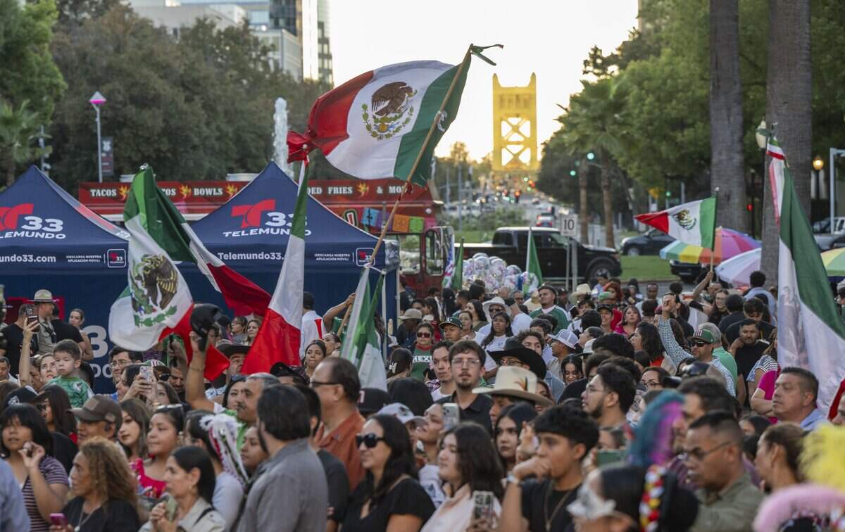 Mexican flags are flown near the state Capitol during the 216th anniversary of Mexican independence on Tuesday.