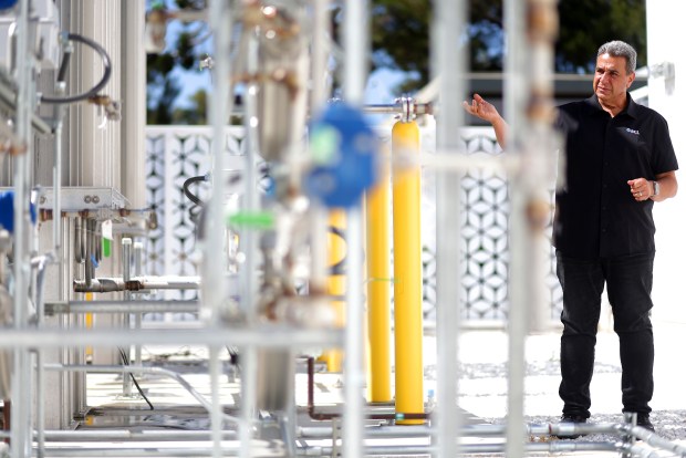 Yuval Bachar the founder ECL tours his company's hydrogen power generation system on Monday, July 28, 2025, in Mountain View, Calif. The energy produced at the facility is used to power an Artificial Intelligence data center. (Aric Crabb/Bay Area News Group)