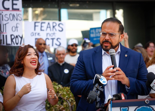 Santa Clara County Supervisor Betty Duong, left, cheers as San Jose councilmember Peter Ortiz speaks during a press conference before a case hearing between Santa Clara County and ICE at the Federal Courthouse in San Jose, Calif., on Tuesday, Sept. 8, 2026. (Shae Hammond/Bay Area News Group)