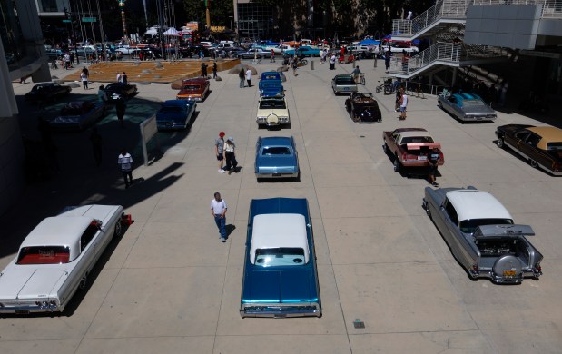 People look at cars on display at the fourth annual San Jose Lowrider Day along East Santa Clara Street in front of San José City Hall in downtown San José, Calif., on Sunday, Sept. 6, 2026. (Nhat V. Meyer/Bay Area News Group)