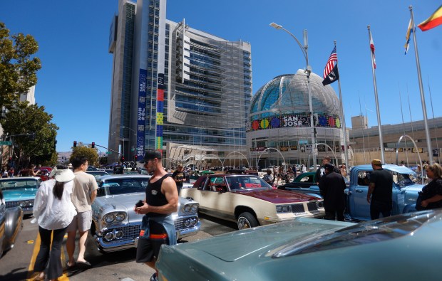 People look at cars on display at the fourth annual San Jose Lowrider Day along East Santa Clara Street in front of San José City Hall in downtown San José, Calif., on Sunday, Sept. 6, 2026. (Nhat V. Meyer/Bay Area News Group)