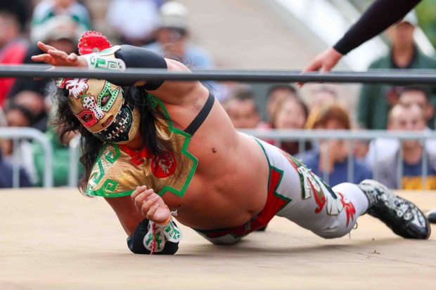 Luchador Azteca performs during Lucha Libre Wrestling Night at Thrive City Plaza in San Francisco, Calif., Thursday, Sept. 24, 2026. Twenty-two wrestlers performed in six matches during the free event hosted by West Coast Pro Wrestling and Pro Wrestling Revolution. (Ray Chavez/Bay Area News Group)