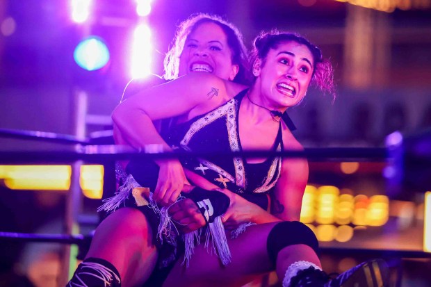 Luchadoras Nyla Rose, left, and Johnnie Robbie perform during Lucha Libre Wrestling Night at Thrive City Plaza in San Francisco, Calif., Thursday, Sept. 24, 2026. Twenty-two wrestlers performed in six matches during the free event hosted by West Coast Pro Wrestling and Pro Wrestling Revolution. (Ray Chavez/Bay Area News Group)