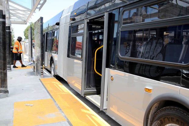 An AC Transit Rapid Bus makes a stop on International Boulevard in Oakland, Calif., on Friday, June 26, 2020. (Ray Chavez/Bay Area News Group)