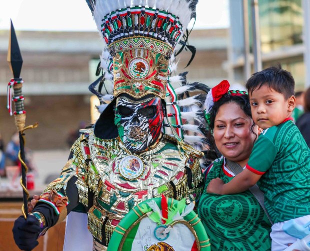 Alfredo Gonzalez, of San Jose, poses for photos in his Guerrero Azteca costume during the 216th anniversary of Mexican Independence Day celebrations at San Jose City Hall in San Jose, Calif., on Tuesday, Sept. 15, 2026. Hundreds of people gathered for "El Grito," or "The Cry," which was announced by Neftali Said Pérez González, consul general of Mexico in San Jose, alongside San Jose Mayor Matt Mahan. (Ray Chavez/Bay Area News Group)