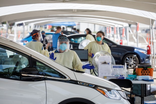 In 2020 during the COVID pandemic, medical staff work at a new COVID-19 test site at the Santa Clara County Fairgrounds in San Jose. Santa Clara County opened a large-scale coronavirus testing site to test thousands of residents daily. (Dai Sugano/Bay Area News Group)