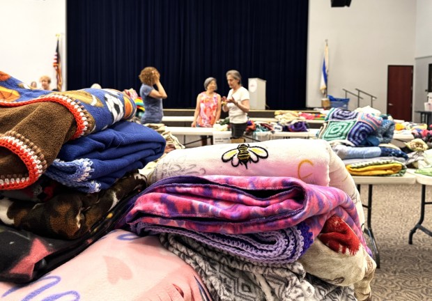 Dozens of volunteer knitters and crocheters fromKnitzvah, a program of Jewish Silicon Valley, sorted hundreds of handmade blankets, sweaters, hats, quilts and other donated items at the Addison-Penzak Jewish Community Center in Los Gatos on Tuesday, Sept. 8, 2026. (Photo courtesy Jewish Silicon Valley)