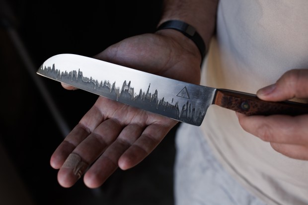 Dimitri Diakopoulos, an artist at the Visual Philosophy Studio, shows a Santoku-style knife in San Jose, Calif., on Aug. 13, 2026. (Dai Sugano/Bay Area News Group)