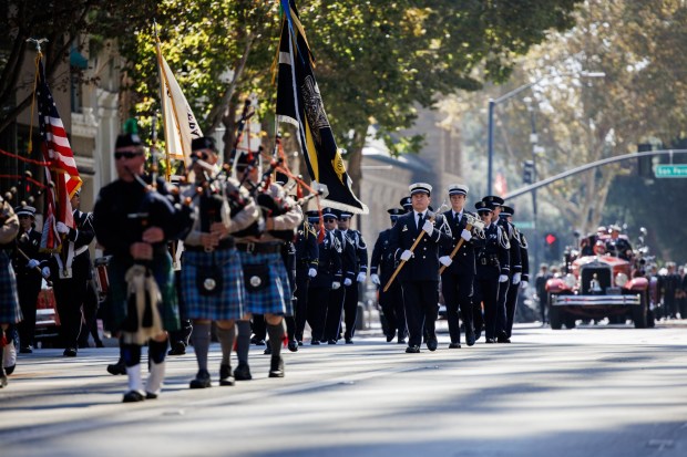 San Jose Fire Department Honor Guard and firefighters and law enforcement officers from multiple agencies march down Market Street during the Patriot Day ceremony on the 25th anniversary of the Sept. 11 attacks in downtown San Jose on Friday, Sept. 11, 2026. (Dai Sugano/Bay Area News Group)