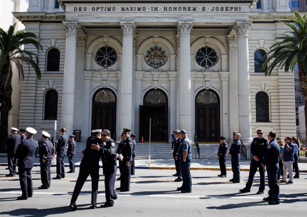 Firefighters from multiple agencies wait before marching down Market Street during the Patriot Day ceremony on the 25th anniversary of the Sept. 11 attacks in downtown San Jose on Friday, Sept. 11, 2026. (Dai Sugano/Bay Area News Group)