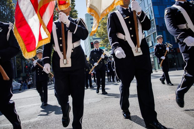 San Jose Fire Department Honor Guard and firefighters and law enforcement officers from multiple agencies march down Market Street during the Patriot Day ceremony on the 25th anniversary of the Sept. 11 attacks in downtown San Jose on Friday, Sept. 11, 2026. (Dai Sugano/Bay Area News Group)