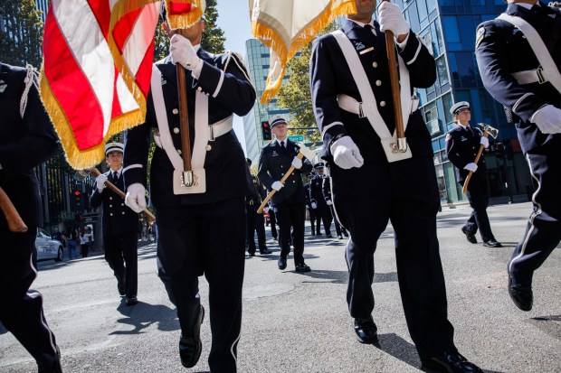 San Jose Fire Department Honor Guard and firefighters and law enforcement officers from multiple agencies march down Market Street during the Patriot Day ceremony on the 25th anniversary of the Sept. 11 attacks in downtown San Jose on Friday, Sept. 11, 2026. (Dai Sugano/Bay Area News Group)