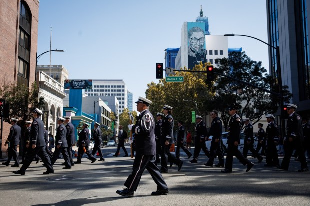 Firefighters from multiple agencies march down Market Street during the Patriot Day ceremony on the 25th anniversary of the Sept. 11 attacks in downtown San Jose on Friday, Sept. 11, 2026. (Dai Sugano/Bay Area News Group)