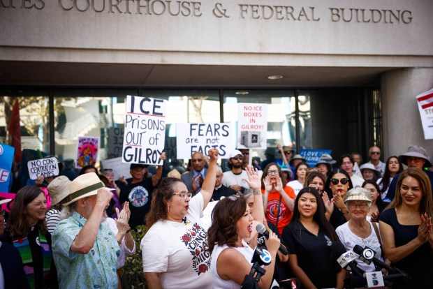 People cheer with Santa Clara County Supervisor Betty Duong, center, during a press conference before a case hearing between Santa Clara County and ICE at the Federal Courthouse in San Jose, Calif., on Tuesday, Sept. 8, 2026. (Shae Hammond/Bay Area News Group)