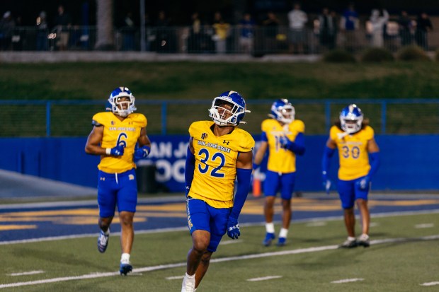 San Jose State University senior cornerback Caleb Womack celebrates his first career interception in the fourth quarter on Saturday. His pick in the end zone helped the Spartans topple visiting Cal Poly-San Luis Obispo 30-20. (Aubrey Tibblis - San José State)