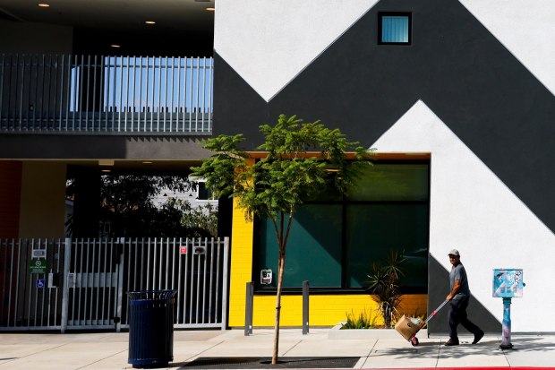 A person walks past 4050 El Cajon Blvd on Thursday, Sept. 17, 2026 in San Diego, California. (Meg McLaughlin / The San Diego Union-Tribune)