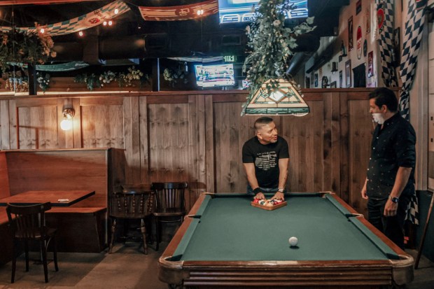 Patrons play Pool at Bock Bar in South Park on Thursday, August 20, 2026. (Photo by Sandy Huffaker for The San Diego Union-Tribune)