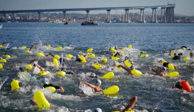 Meet the charity which has people swimming from Coronado to the USS Midway