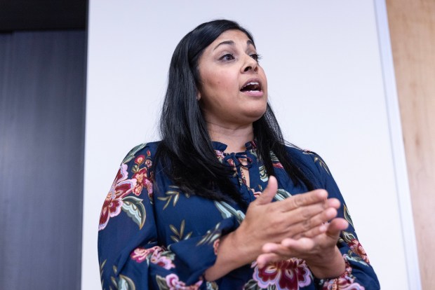 Arnali Ray, executive director ofHollywood Food Coalition, speaks to nonprofit leaders. (Luke Johnson / The San Diego Union-Tribune)
