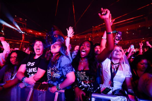 Fans sing along as Pierce the Veil performs during their hometown finale for the band's "I Can't Hear You World Tour" at Petco Park on Saturday. (Meg McLaughlin / The San Diego Union-Tribune)