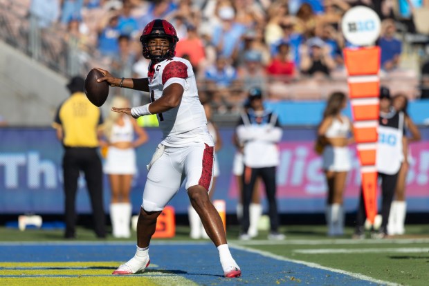 San Diego State quarterback Jayden Denegal throws a pass during Saturday's game against UCLA at the Rose Bowl in Pasadena. (Luke Johnson / The San Diego Union-Tribune)