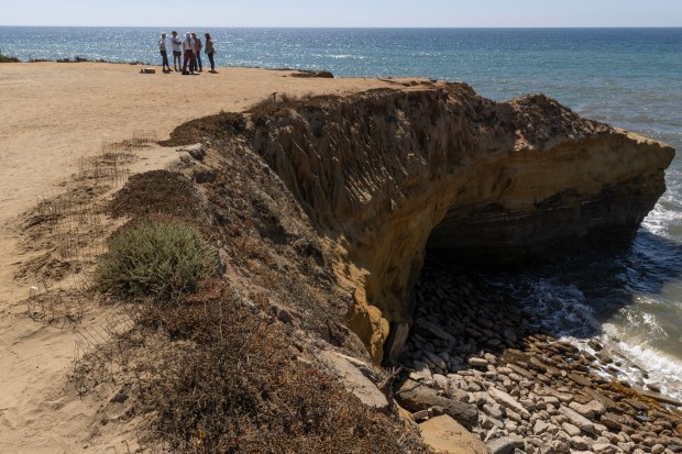 Friends of Sunset Cliffs gather at Sunset Cliffs on Wednesday, Sept. 2, 2026, in San Diego. (Luke Johnson / The San Diego Union-Tribune)
