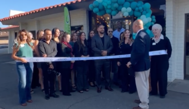 man speaking at ribbon cutting